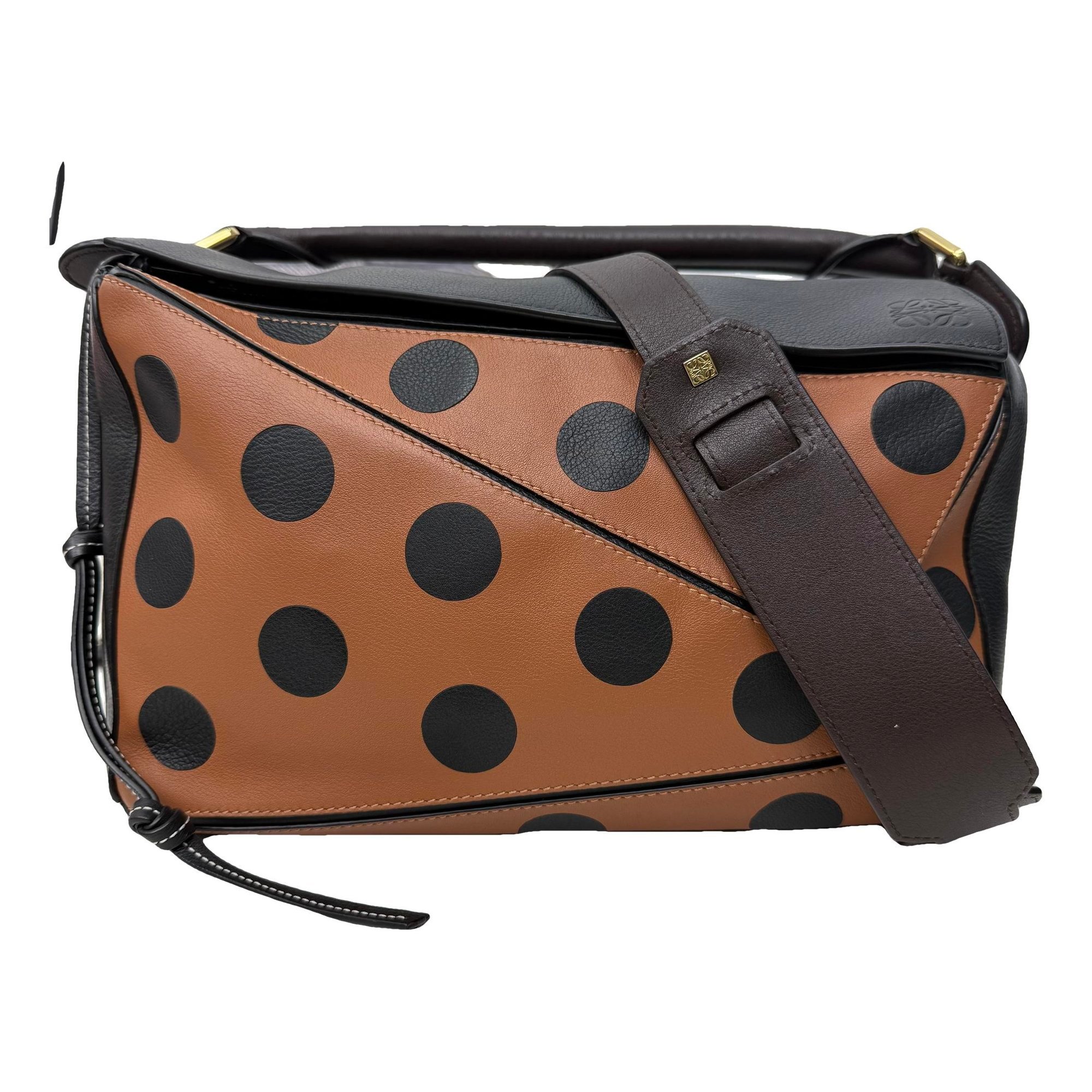 Puzzle leather handbag