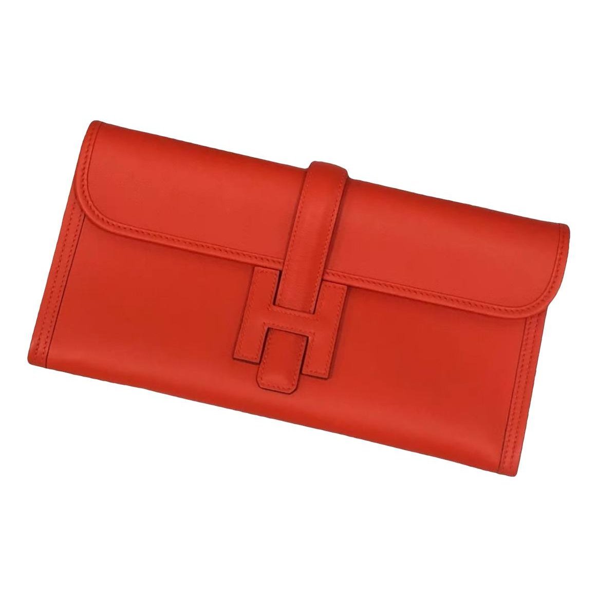 Jige leather clutch bag