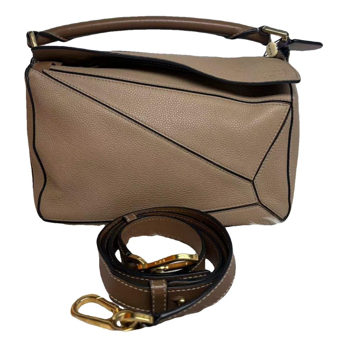 Puzzle leather handbag
