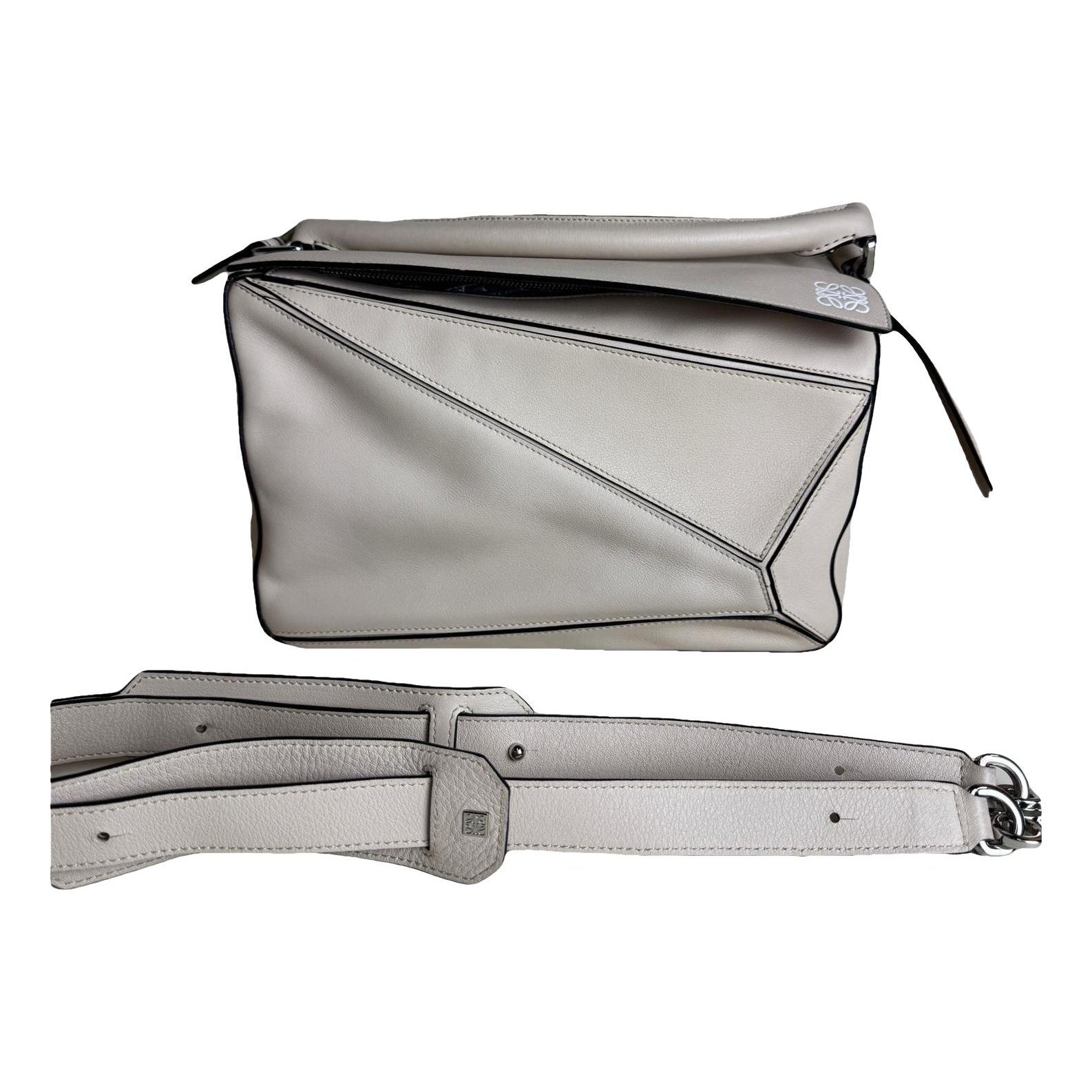 Puzzle leather handbag