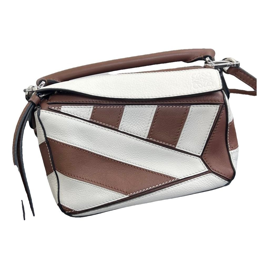 Puzzle leather handbag