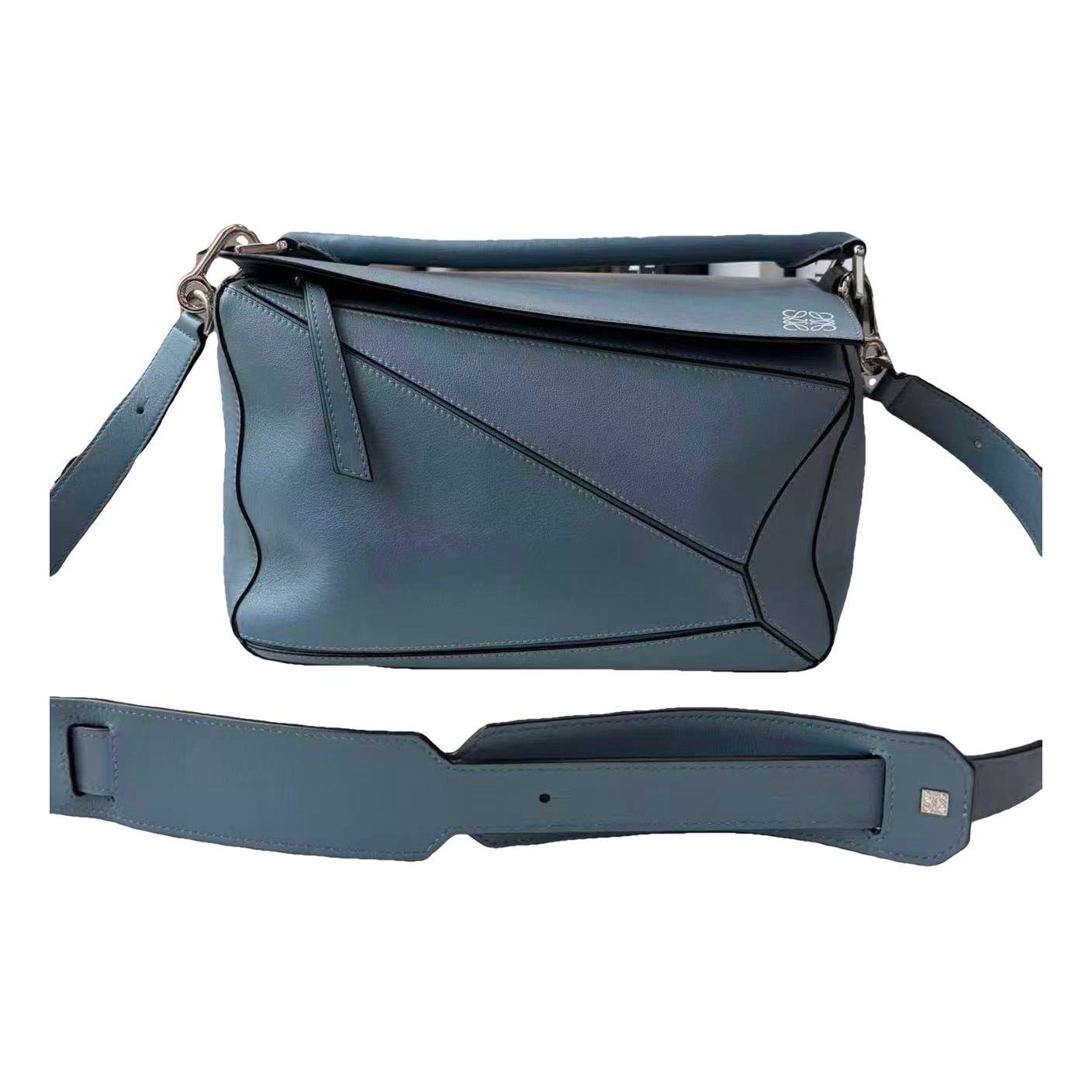 Puzzle leather handbag