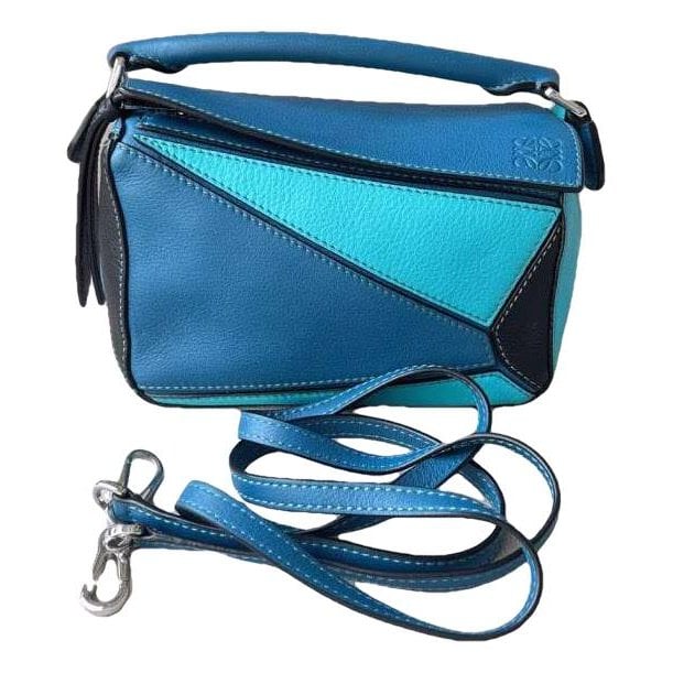 Puzzle leather handbag