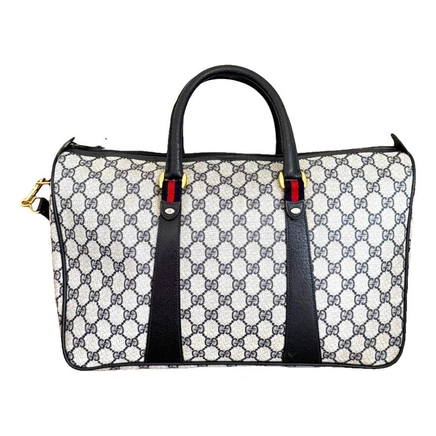 Ophidia Boston patent leather handbag