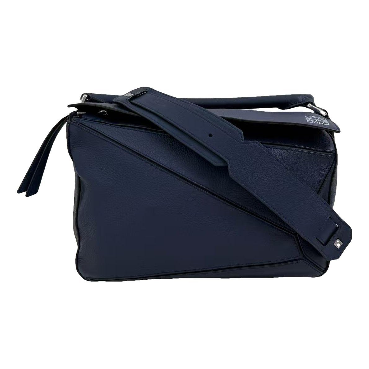 Puzzle leather handbag