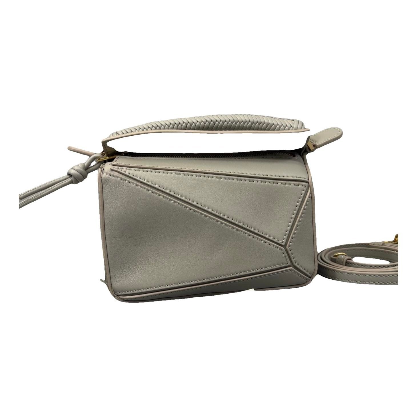 Puzzle leather handbag