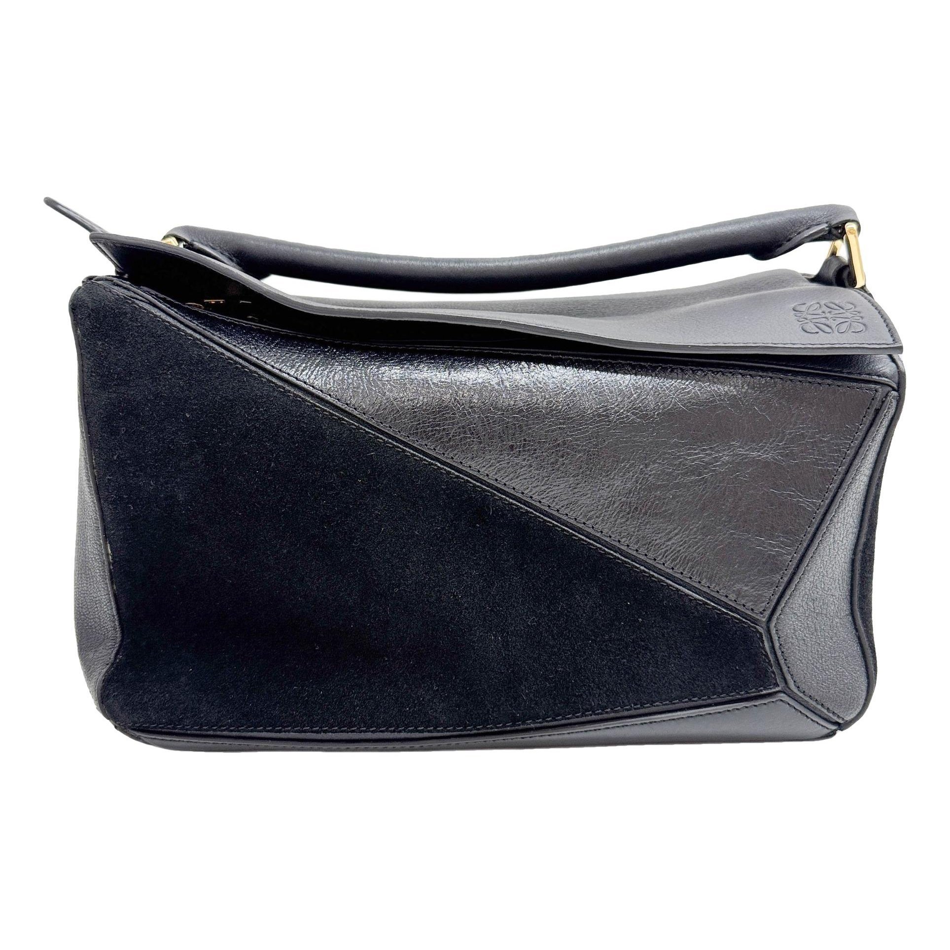 Puzzle leather handbag