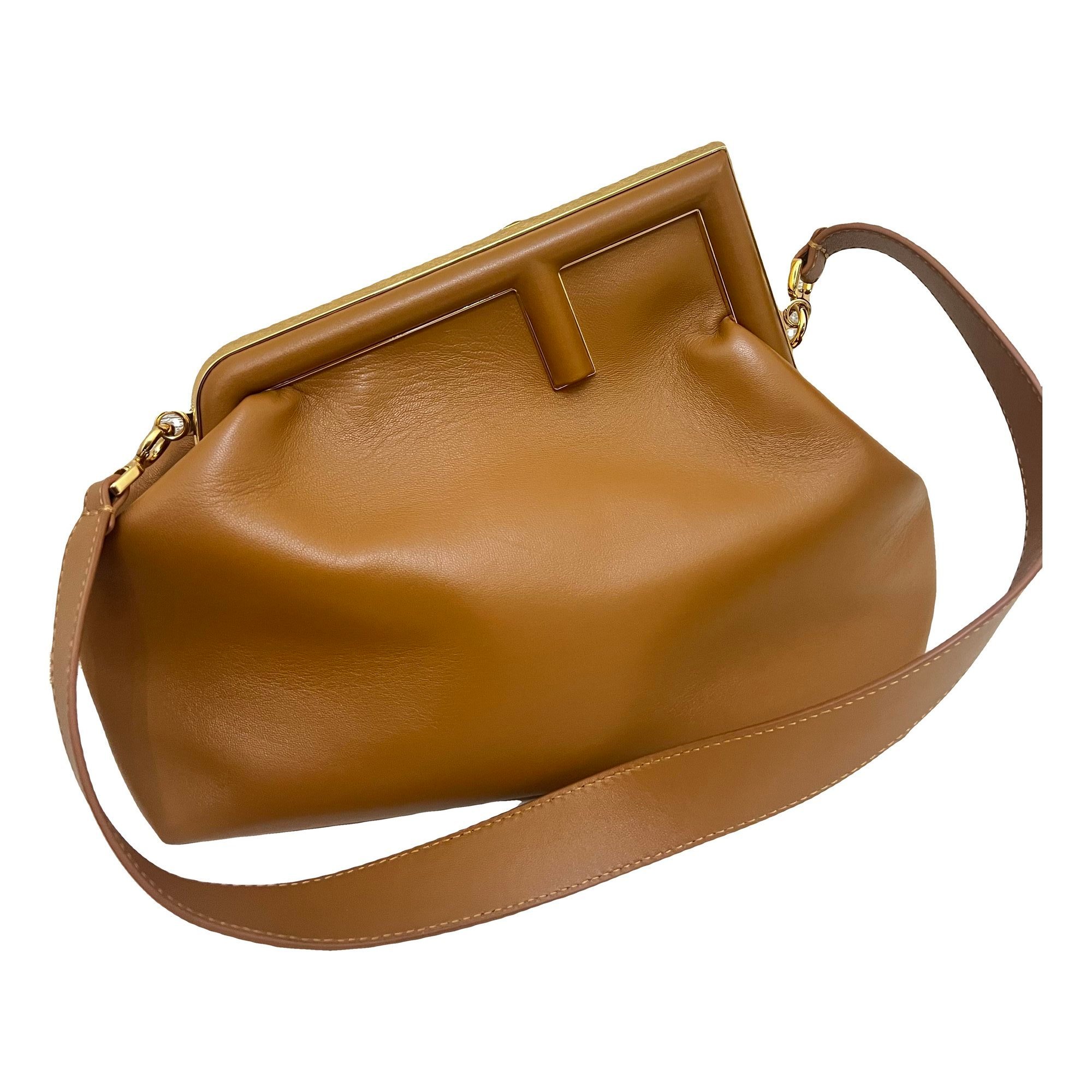 First leather handbag