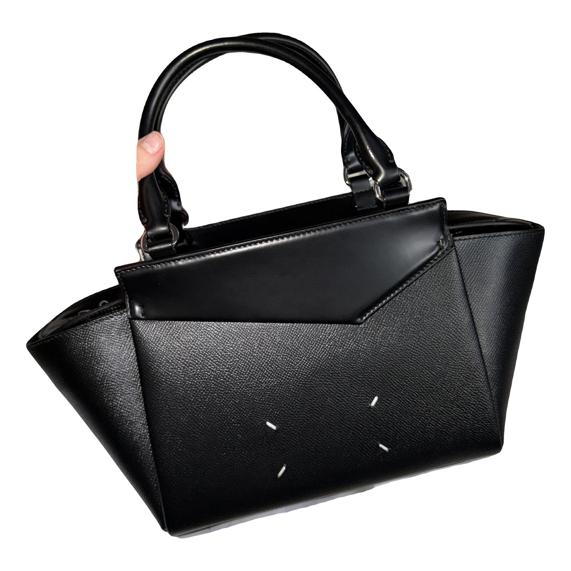 Snatched leather handbag