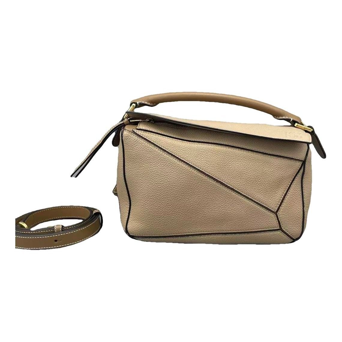 Puzzle leather handbag