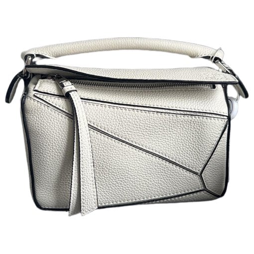 Puzzle leather handbag