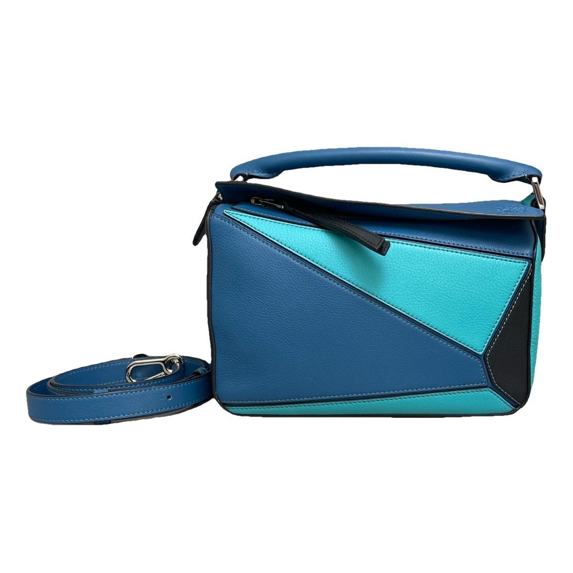 Puzzle leather handbag