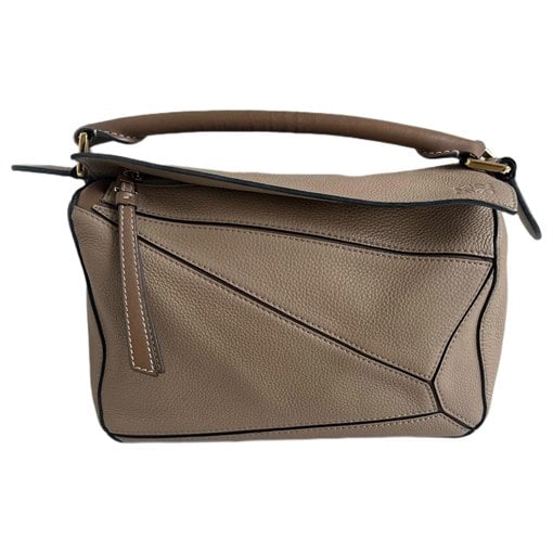 Puzzle leather handbag