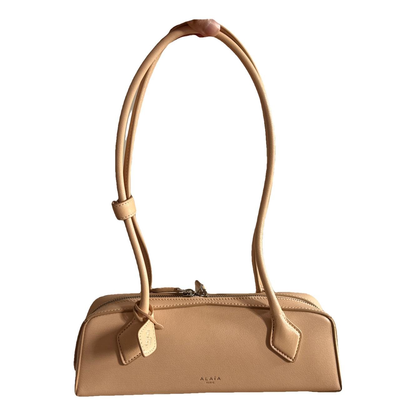 Le Teckel leather handbag