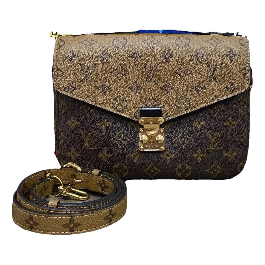 Louis Vuitton Metis leather handbag