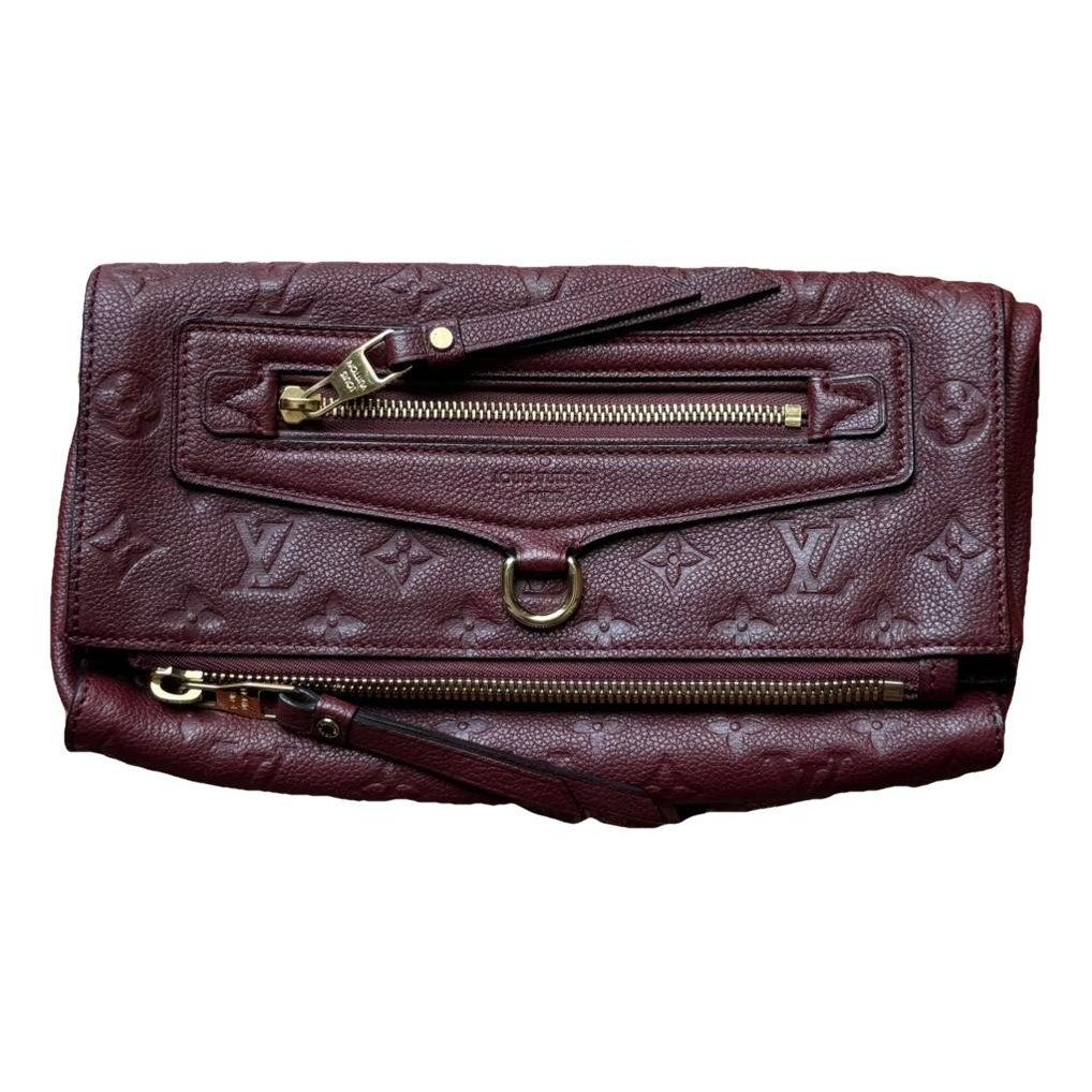 Pétillante leather clutch bag