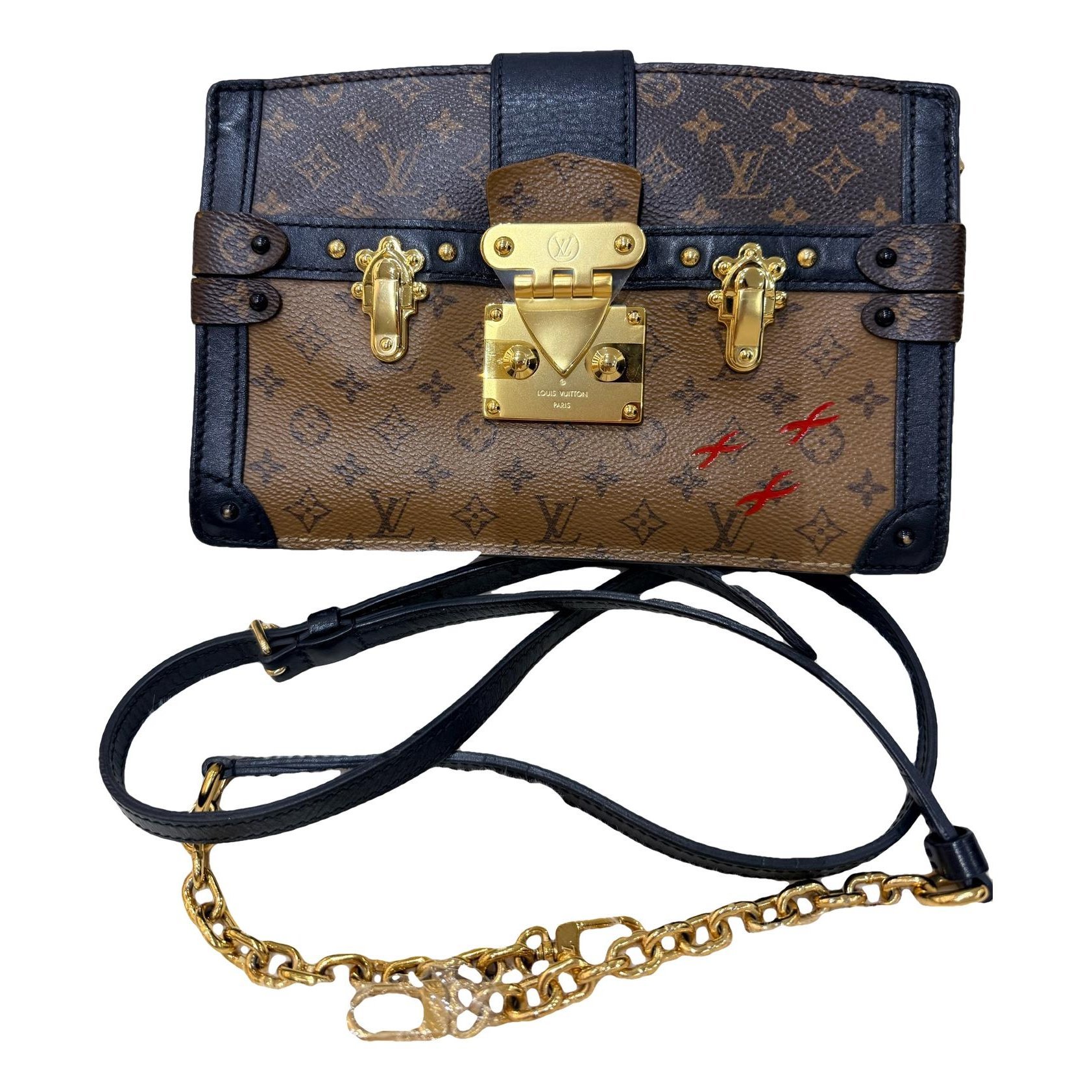 Pochette Trunk leather handbag