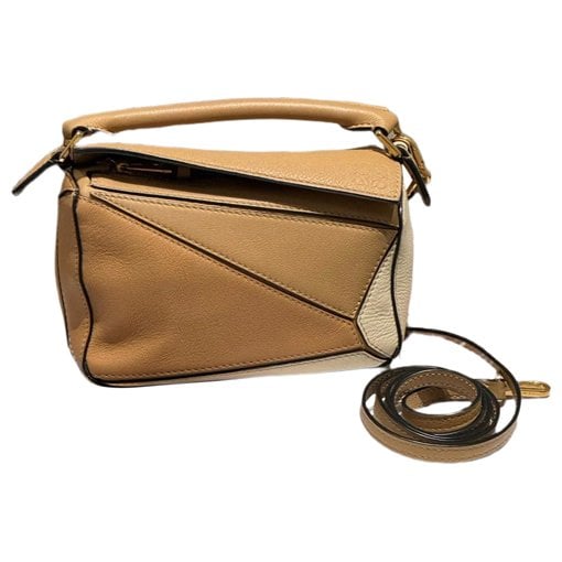 Puzzle leather crossbody bag