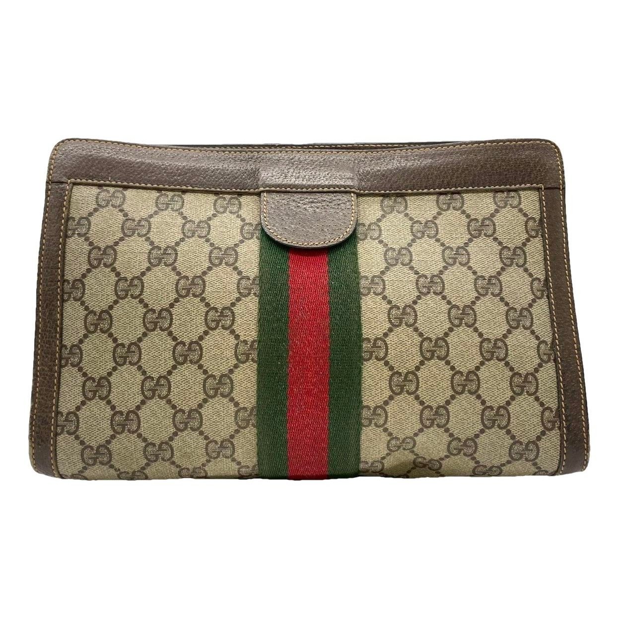 Ophidia leather clutch bag
