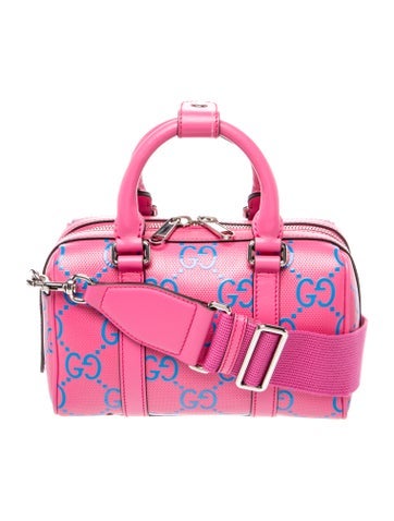 GG Embossed Top Handle Bag
