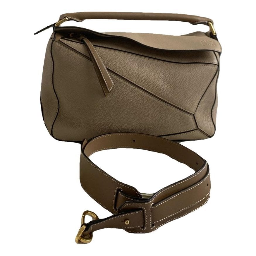 Puzzle leather handbag