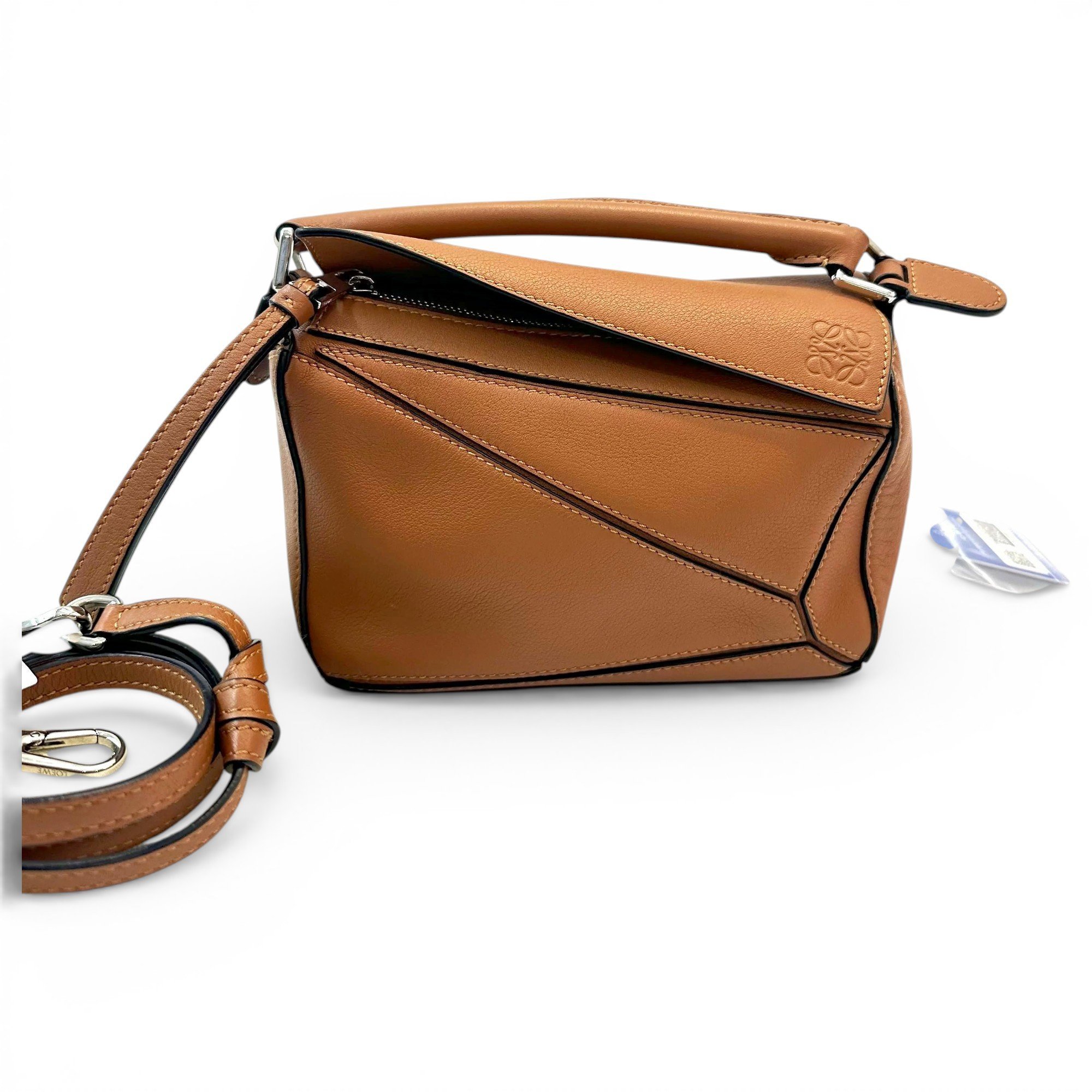 Puzzle leather handbag