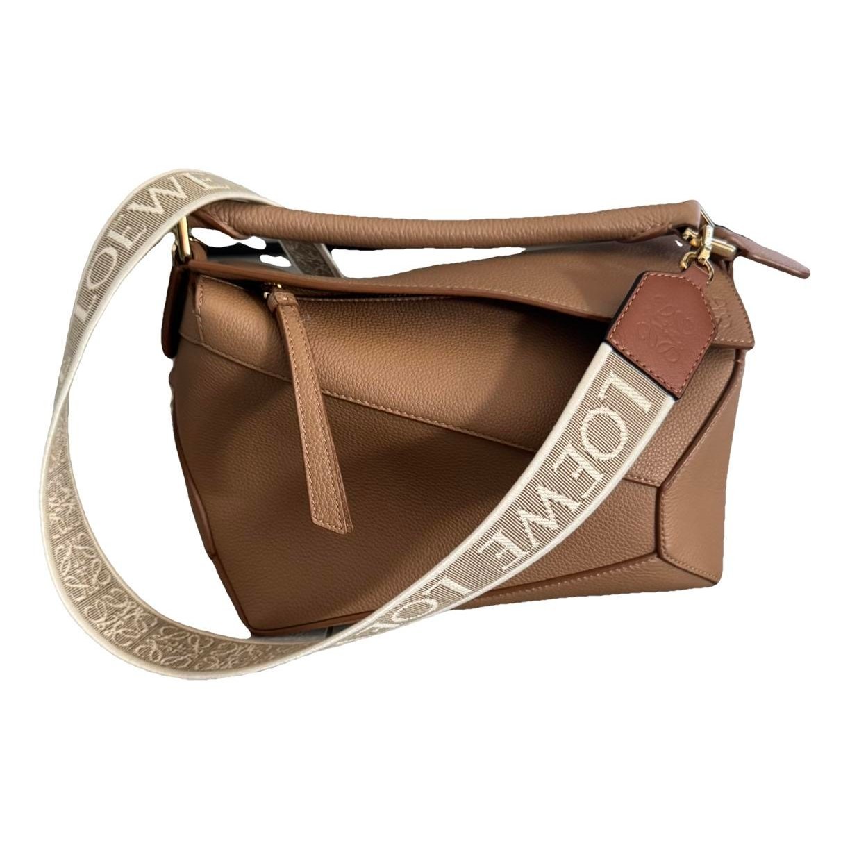 Puzzle leather handbag