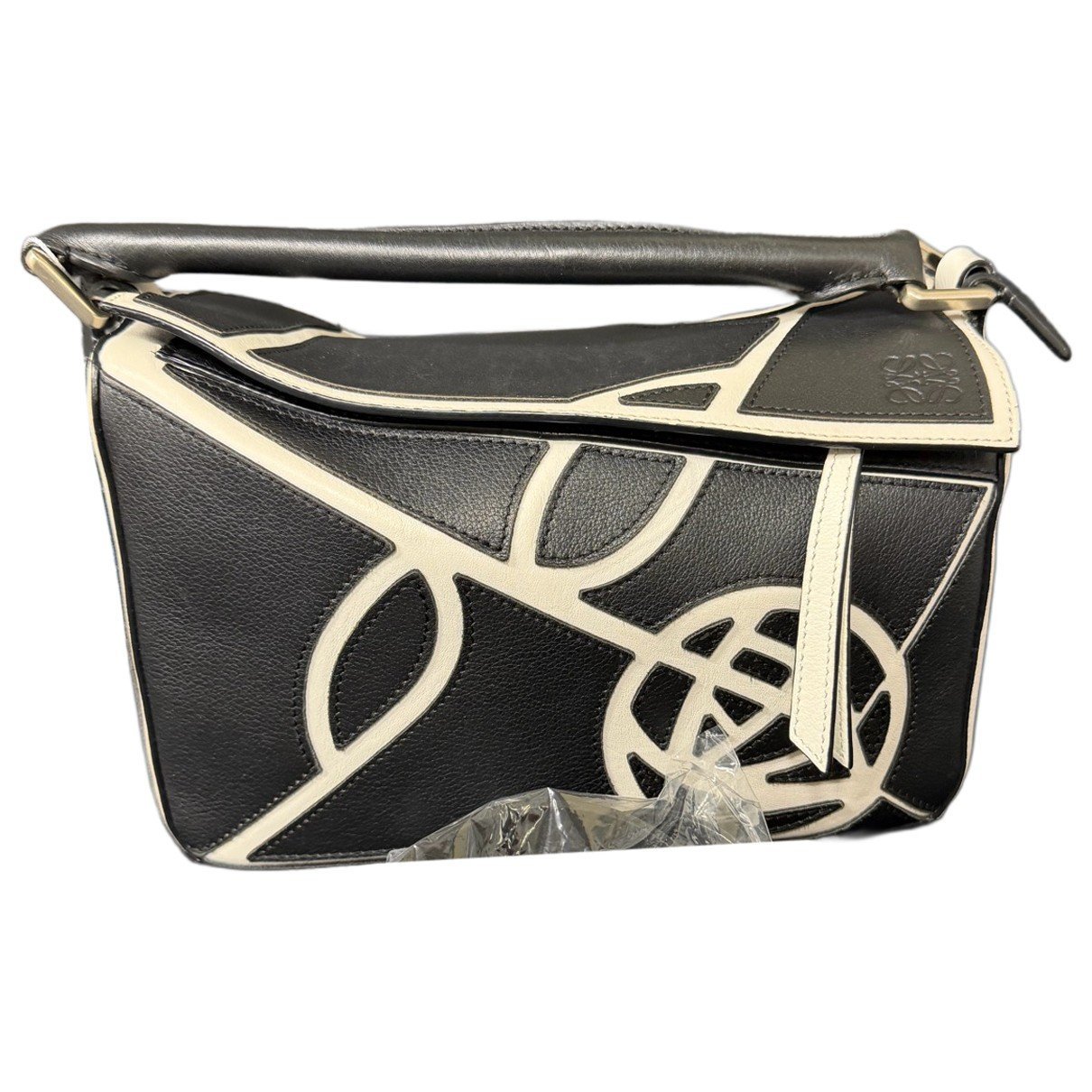 Puzzle leather handbag