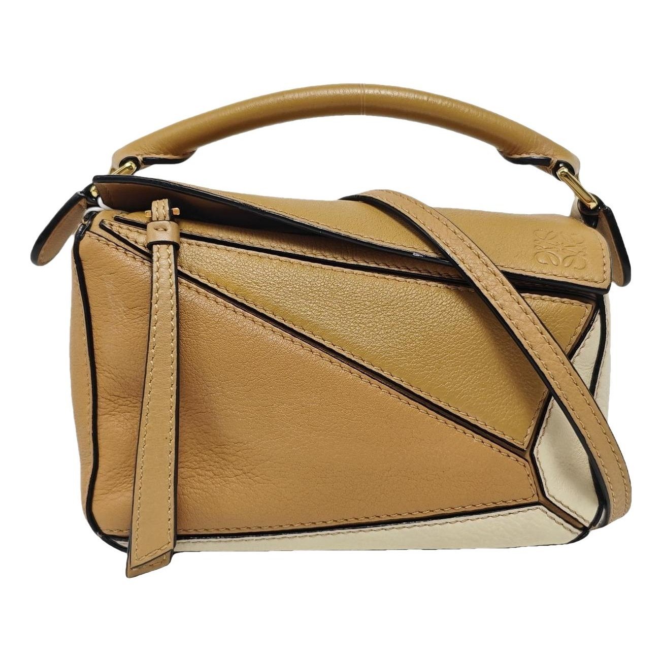 Puzzle leather handbag