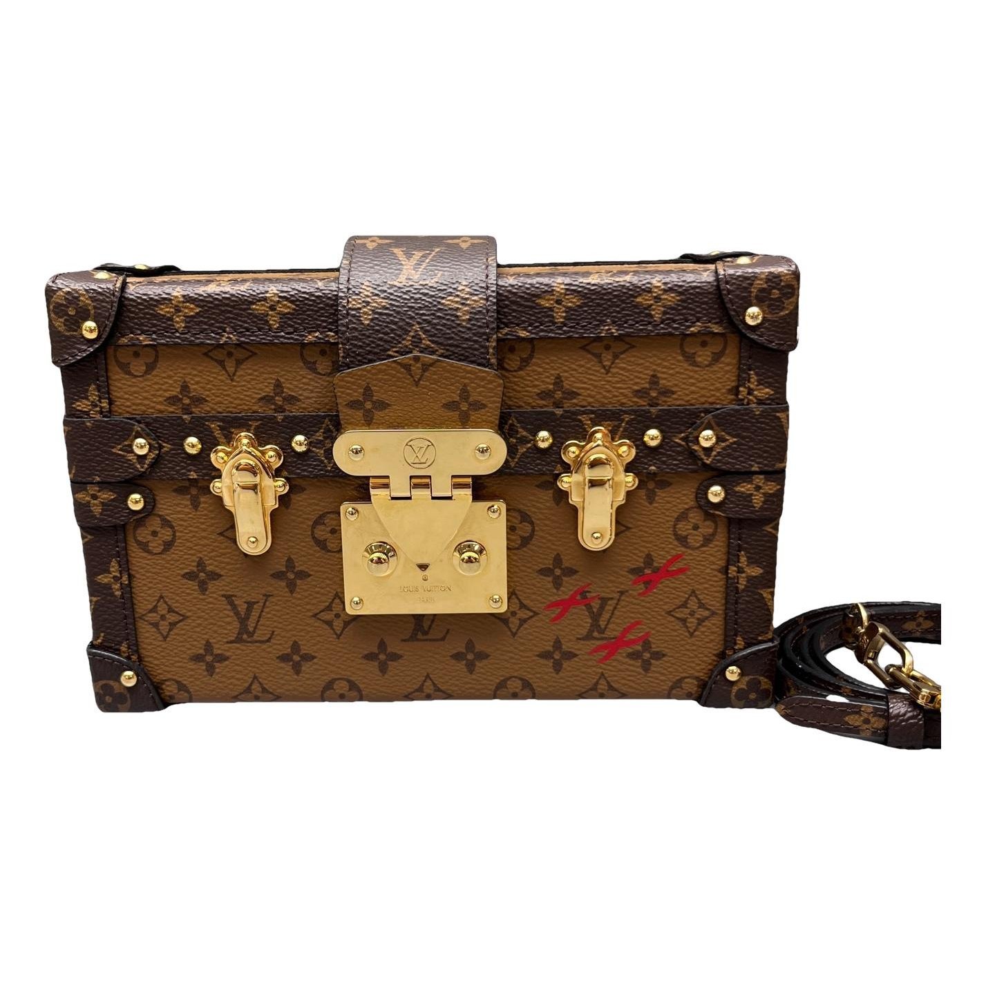 Petite Malle leather handbag