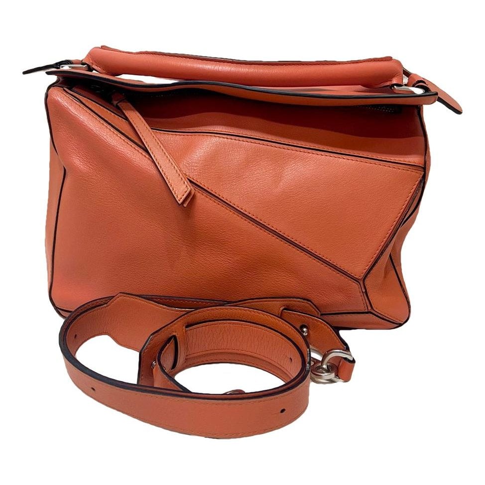 Puzzle leather handbag