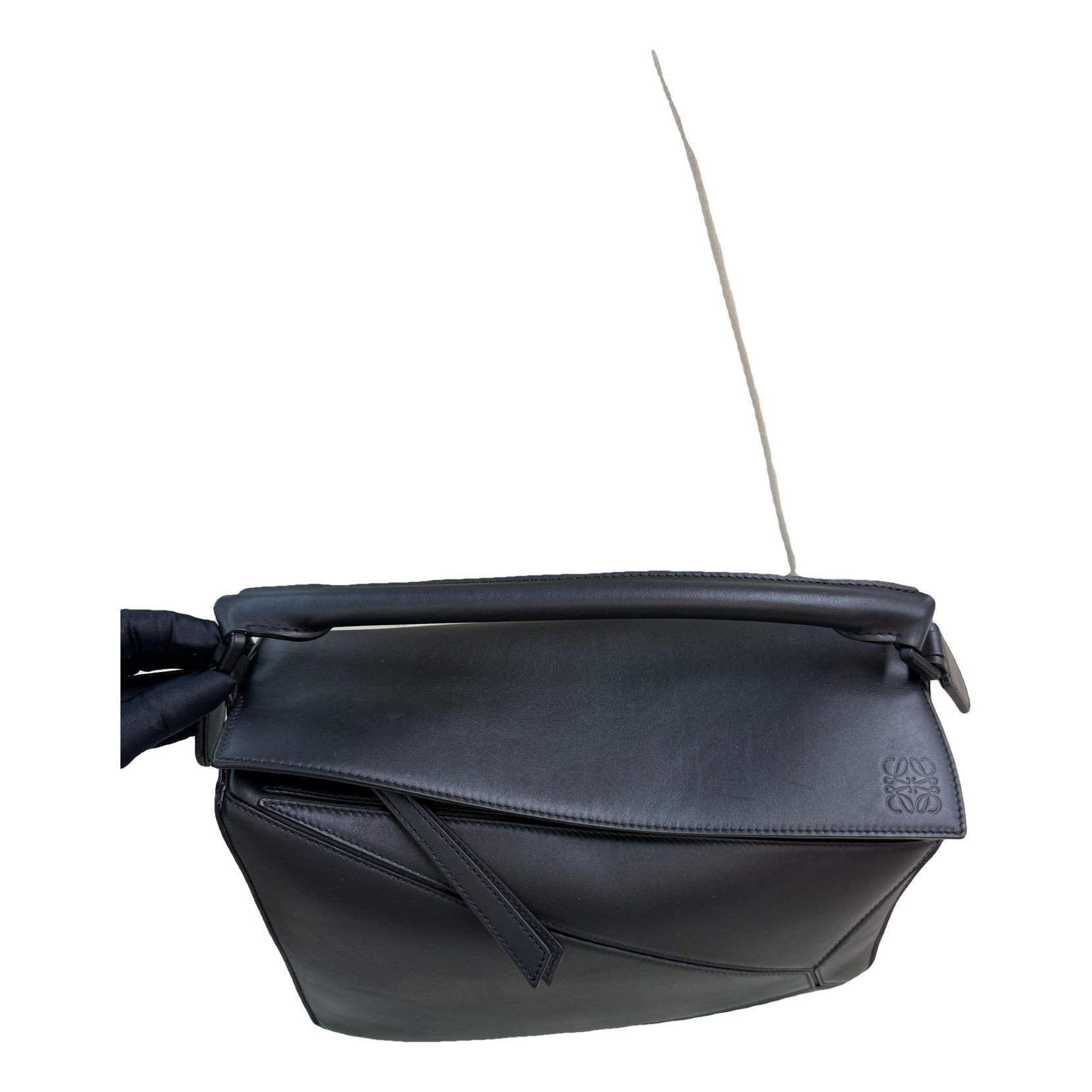Puzzle leather handbag
