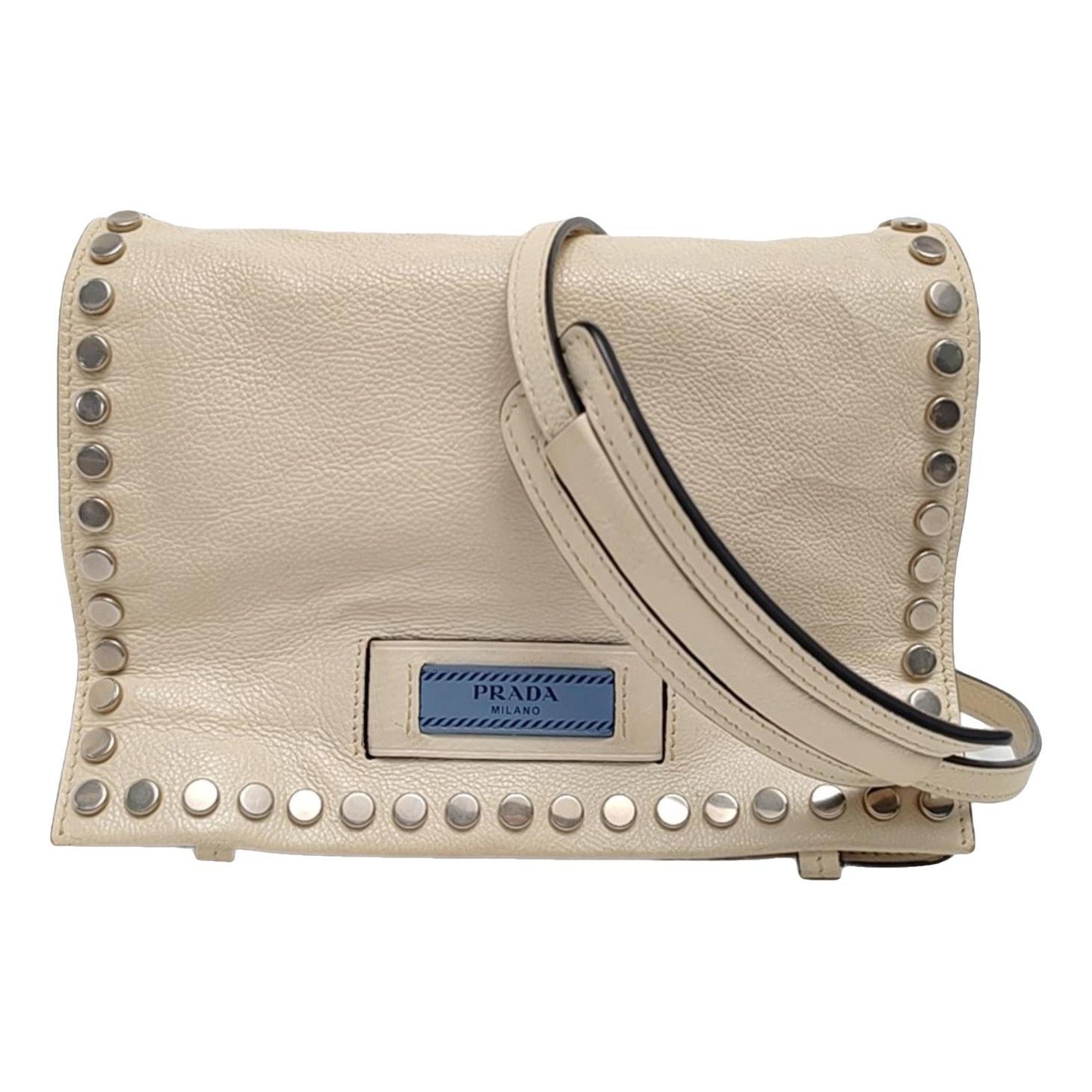Etiquette leather handbag