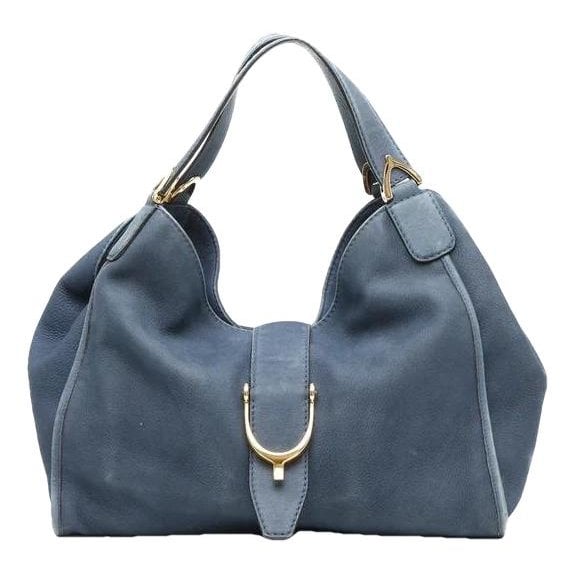 Stirrup leather tote