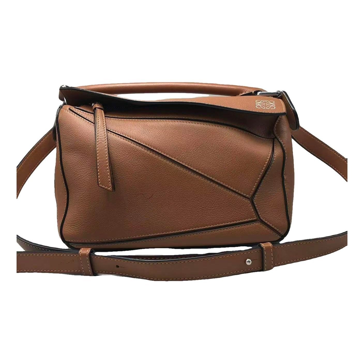 Puzzle leather handbag