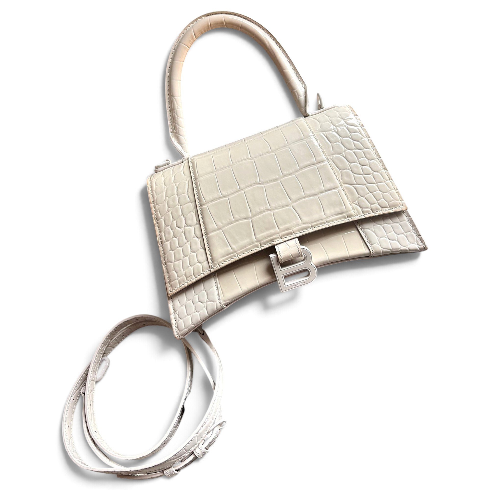 Hourglass patent leather handbag