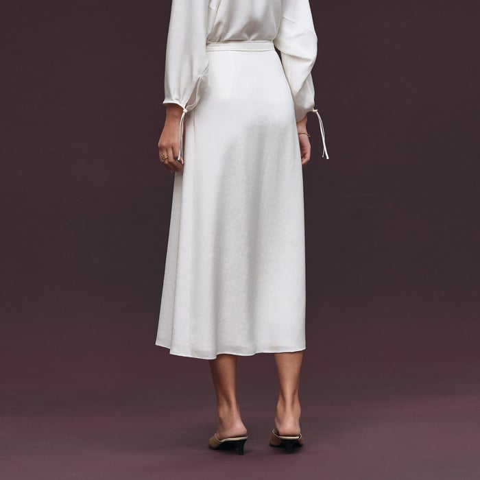 Blanc Cassé "H Kelly" Flared Asymmetric Skirt