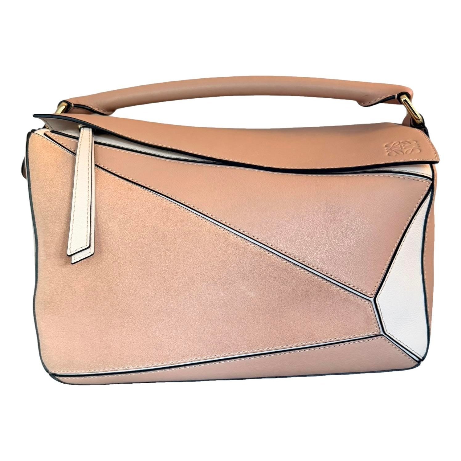 Puzzle leather handbag