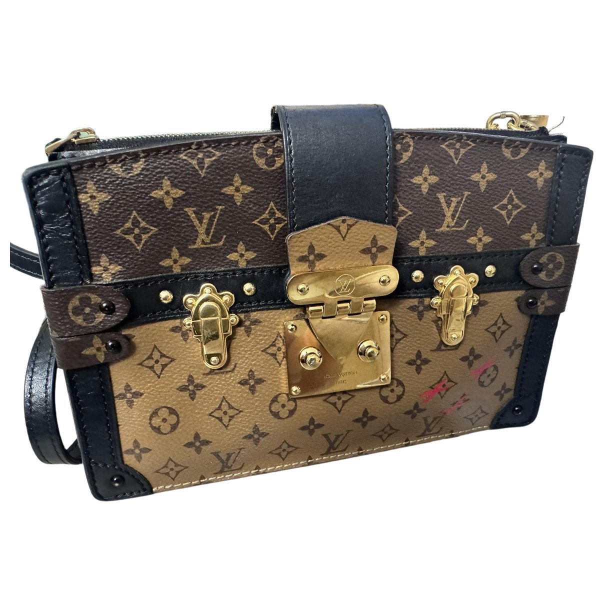 Pochette Trunk leather handbag