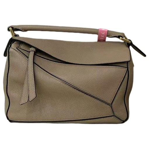 Puzzle leather handbag