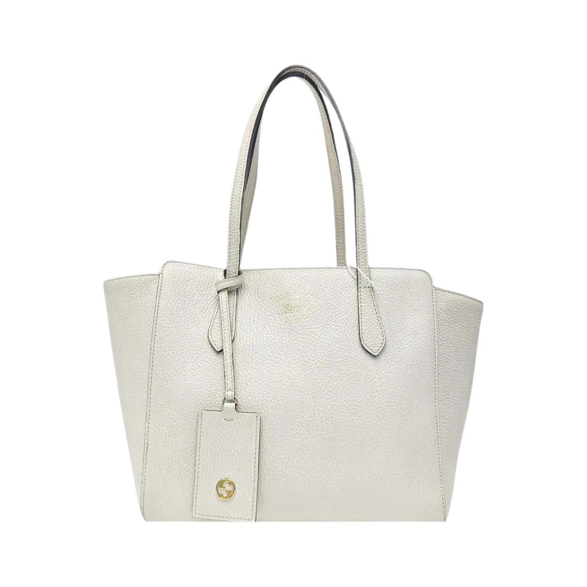 Swing leather handbag