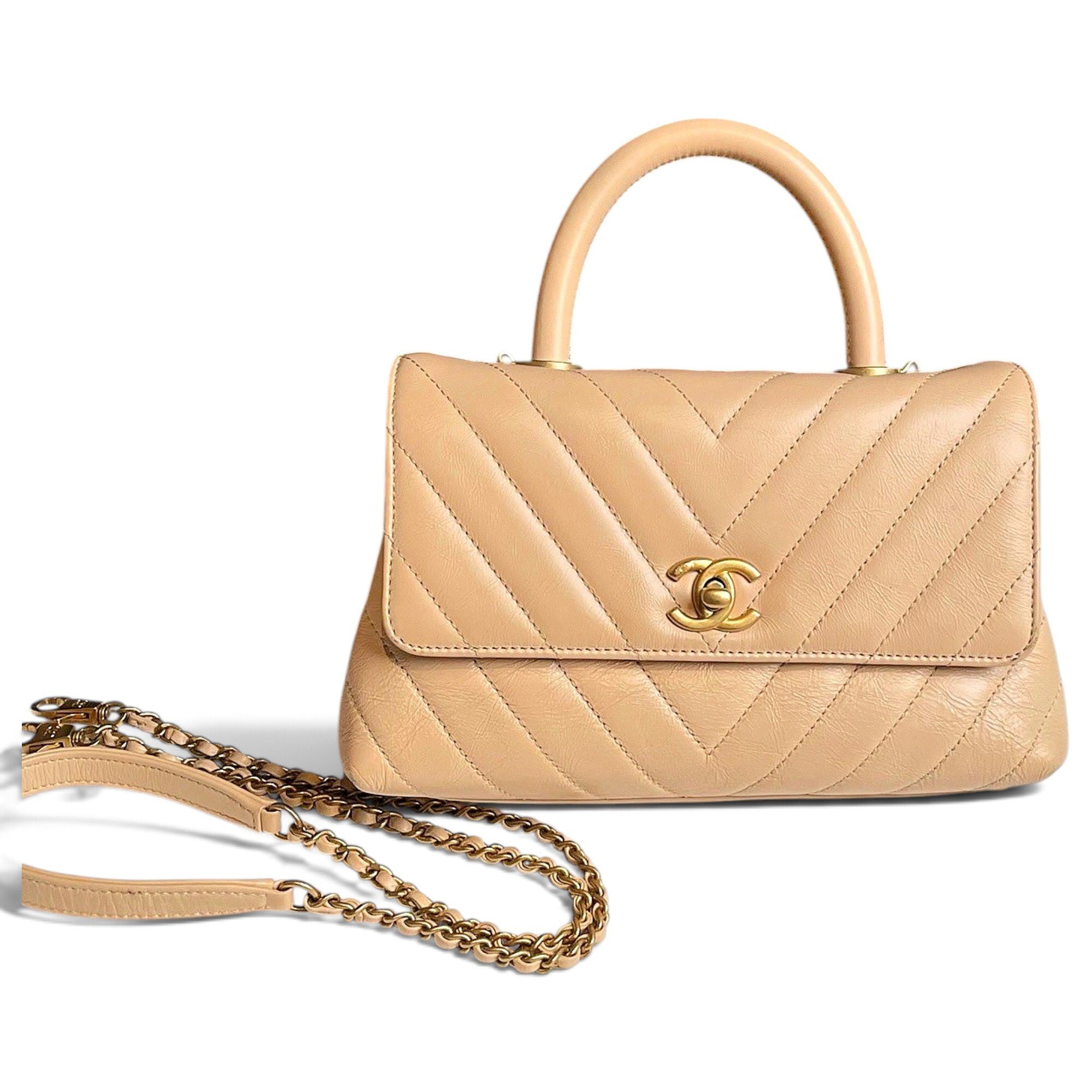 Trendy CC Top Handle leather handbag