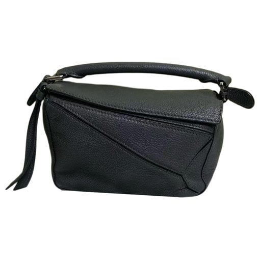Puzzle leather handbag