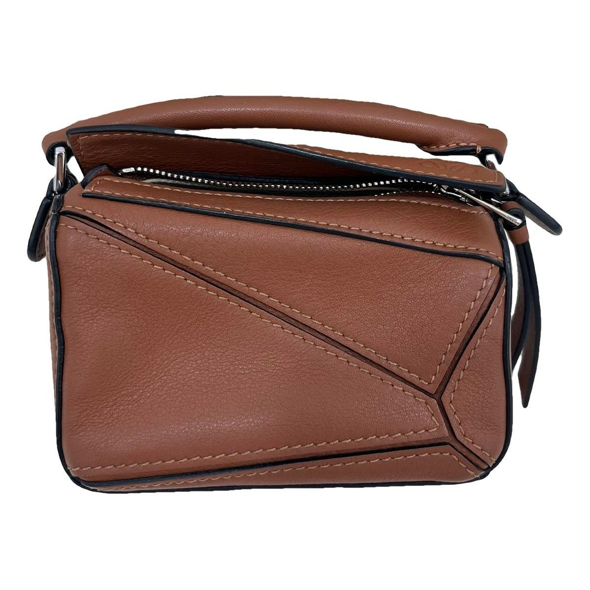 Puzzle leather handbag