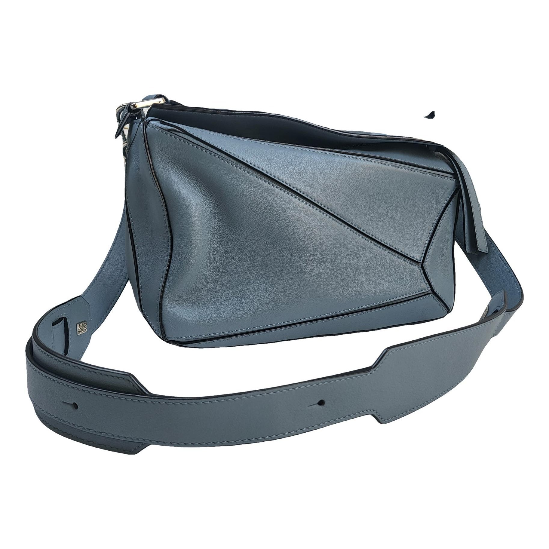 Puzzle leather handbag