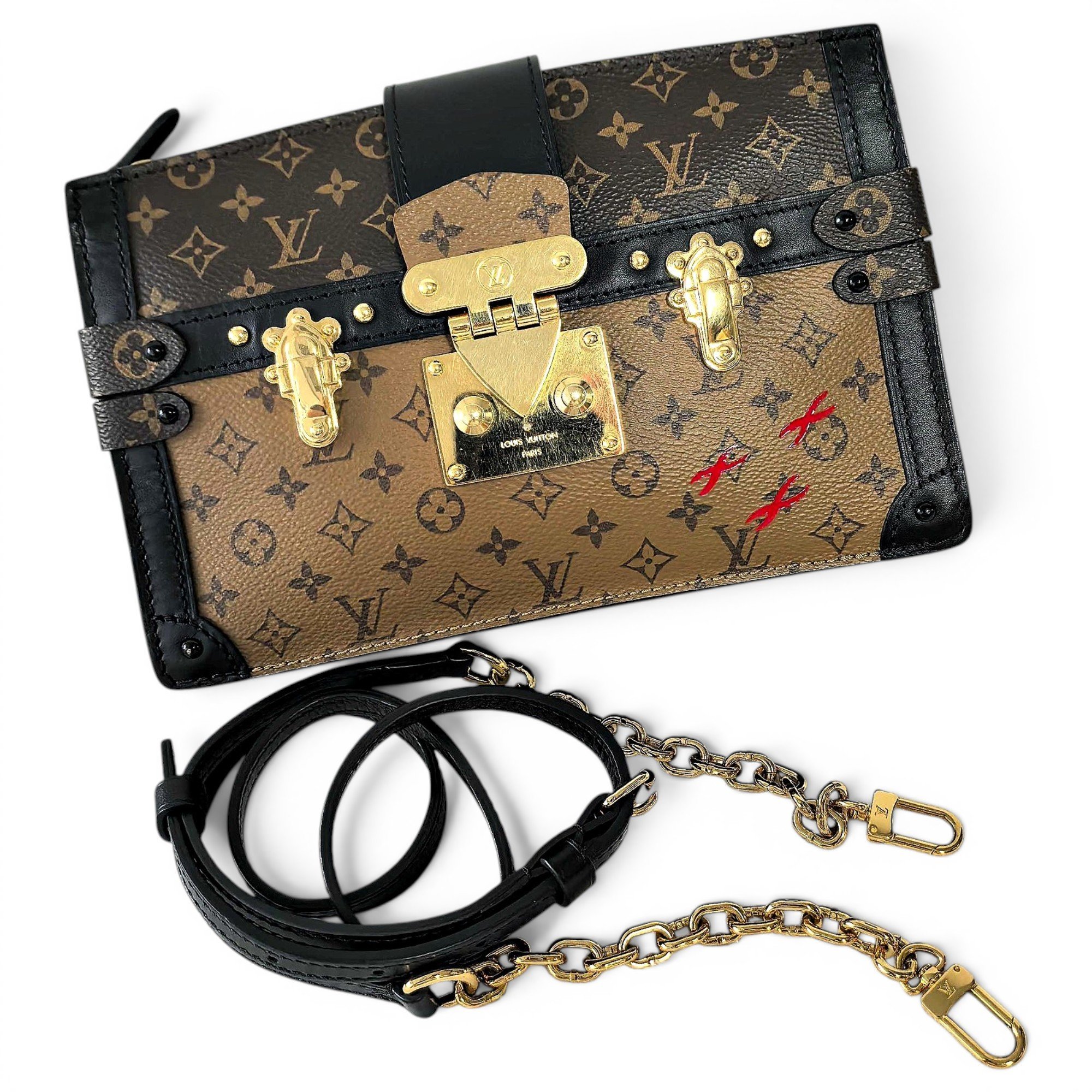 Pochette Trunk leather handbag