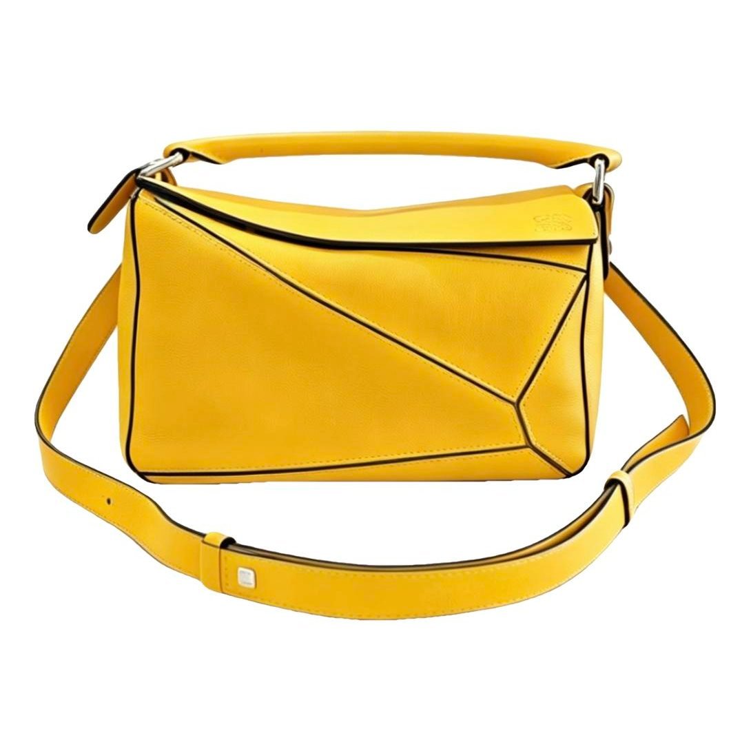 Puzzle leather handbag