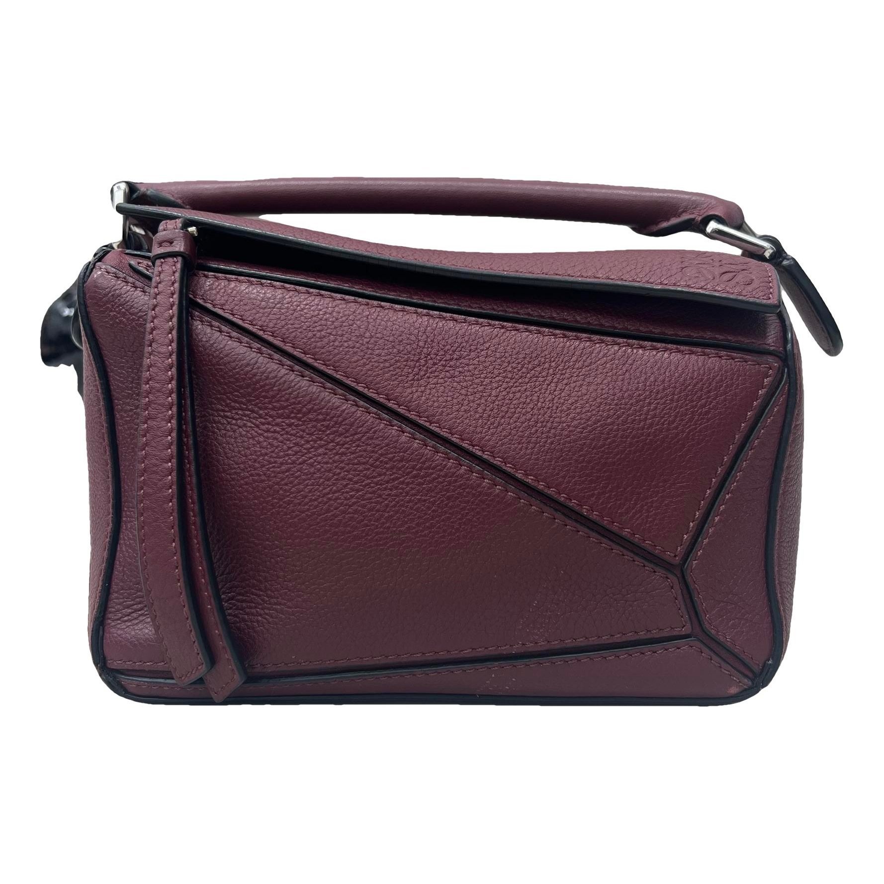 Puzzle leather handbag
