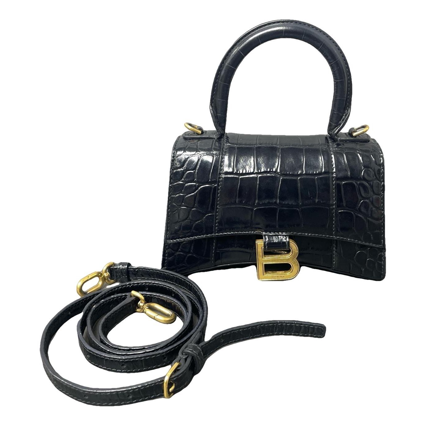 Hourglass leather handbag