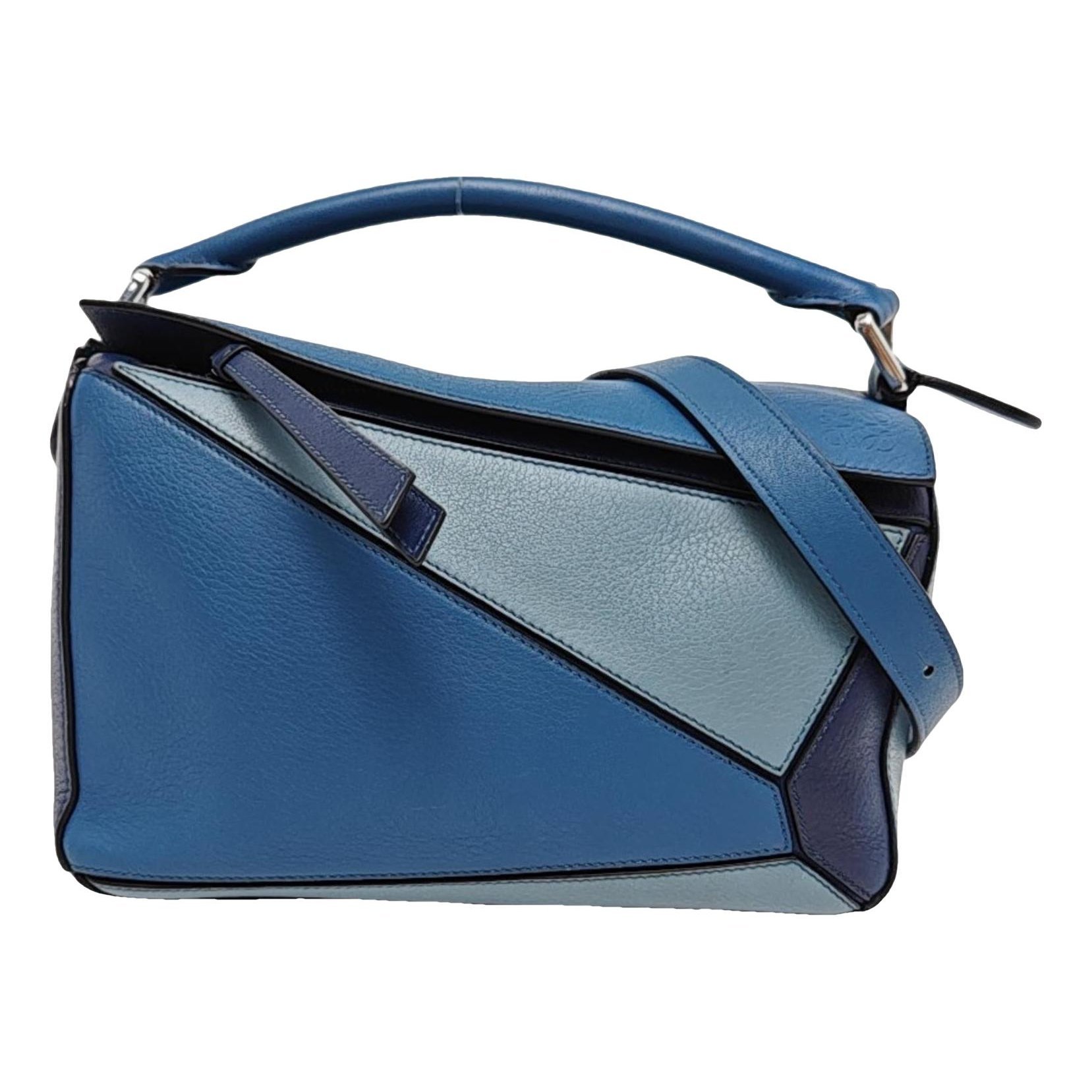 Puzzle leather handbag